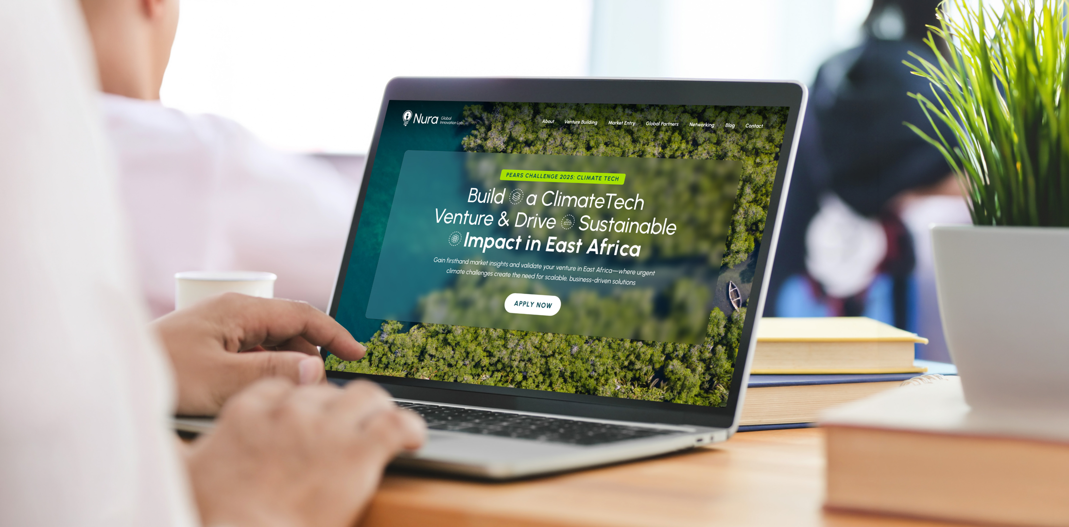 The Nura ClimateTech site open on a laptop